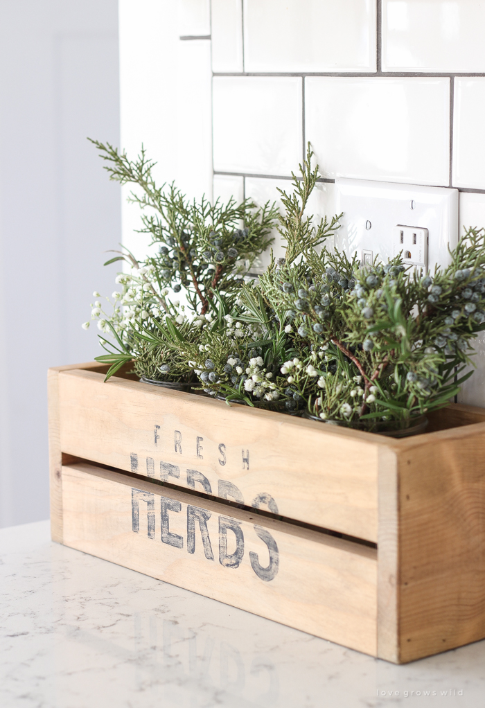 A beautiful farmhouse kitchen decorated for the holidays!