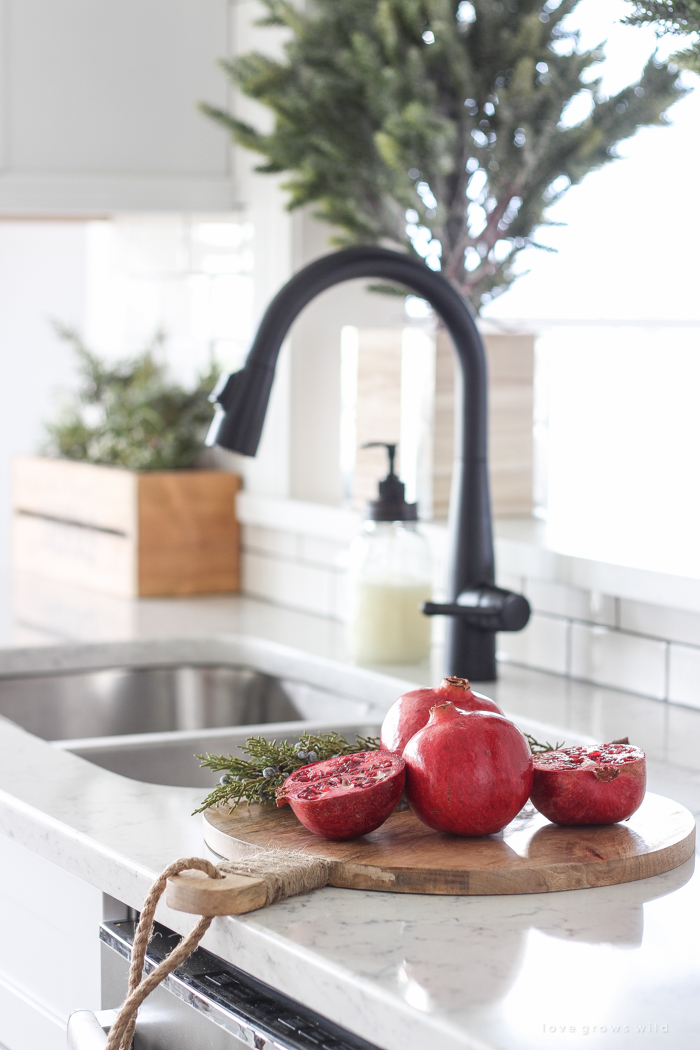 A beautiful farmhouse kitchen decorated for the holidays!