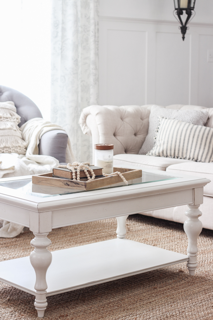 A beautiful farmhouse living room that feels cozy, bright, and totally charming!