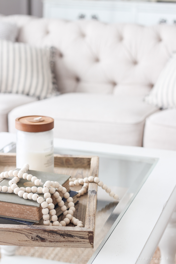 A beautiful farmhouse living room that feels cozy, bright, and totally charming!