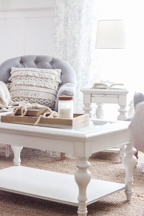 A beautiful farmhouse living room that feels cozy, bright, and totally charming!