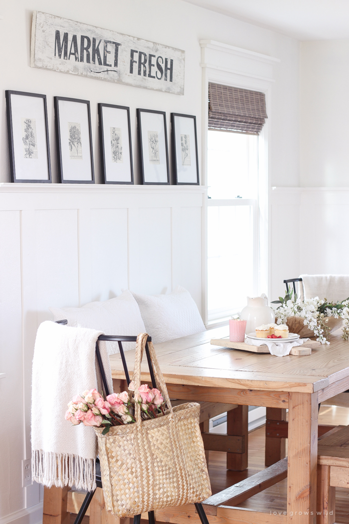 A pretty farmhouse dining room decorated for spring!