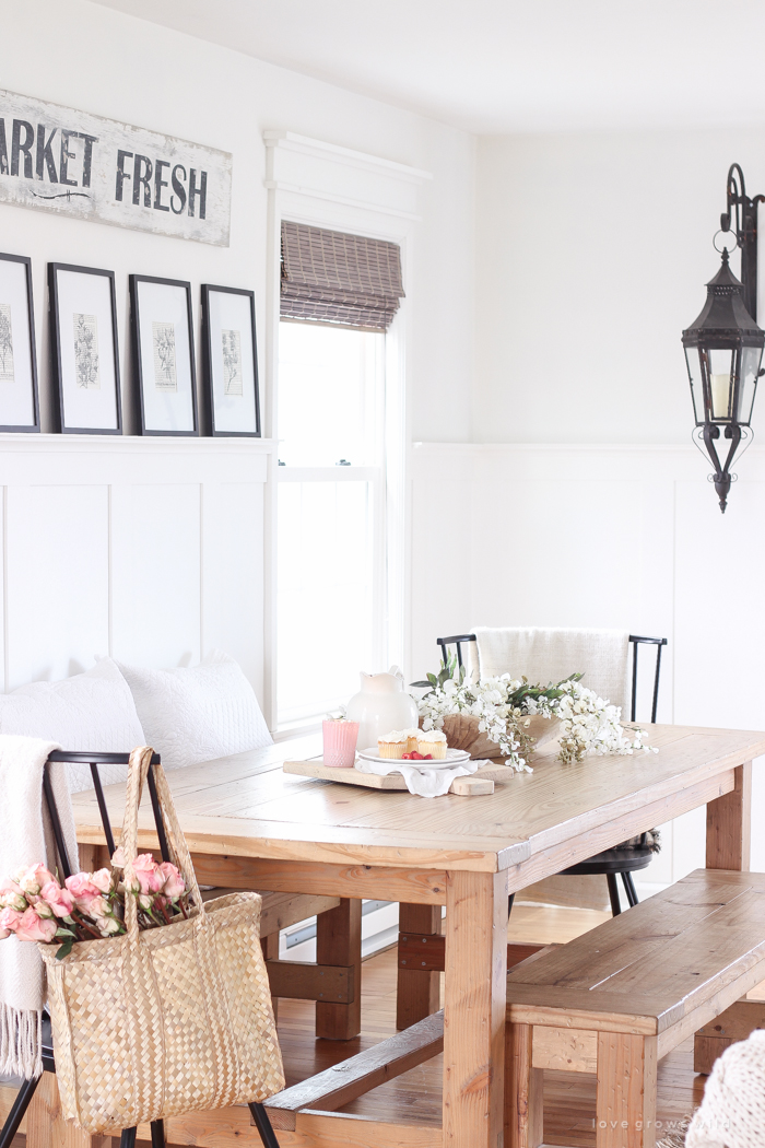 A pretty farmhouse dining room decorated for spring!