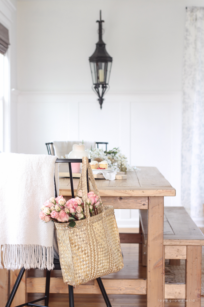 A pretty farmhouse dining room decorated for spring!