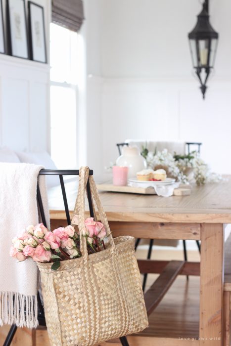 A pretty farmhouse dining room decorated for spring!
