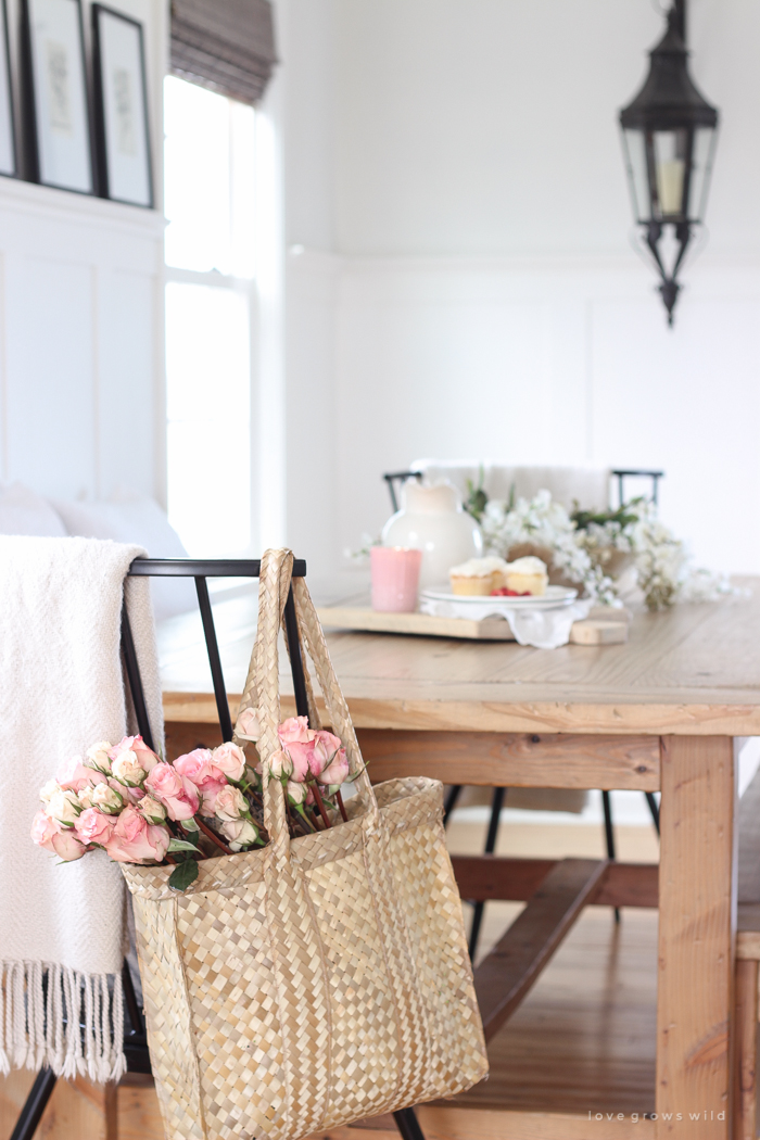 A pretty farmhouse dining room decorated for spring!