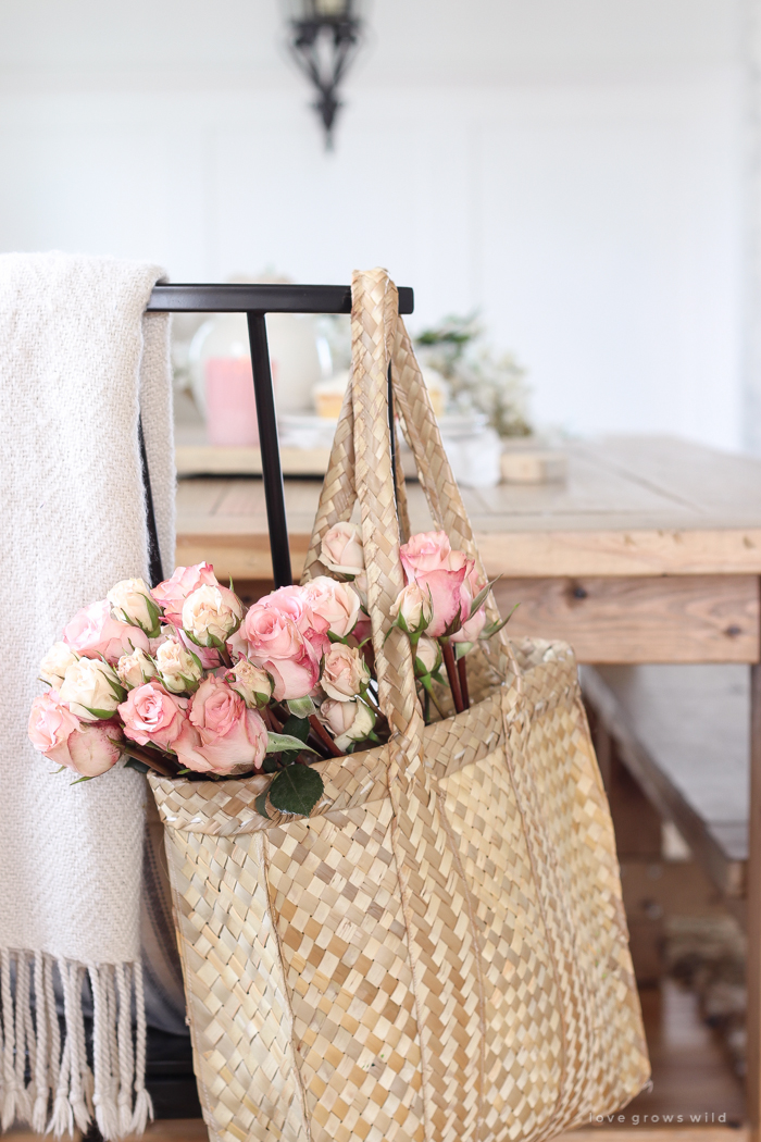 A pretty farmhouse dining room decorated for spring!