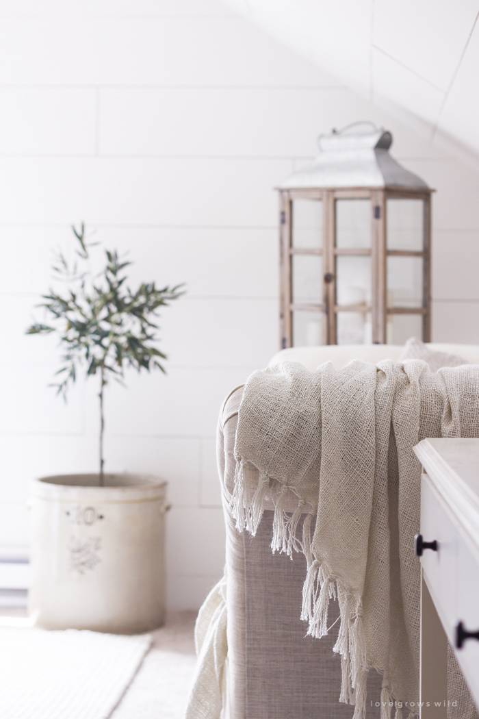 A clean and cozy farmhouse master bedroom with tons of vintage charm