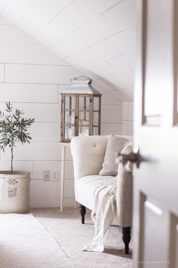 A clean and cozy farmhouse master bedroom with tons of vintage charm