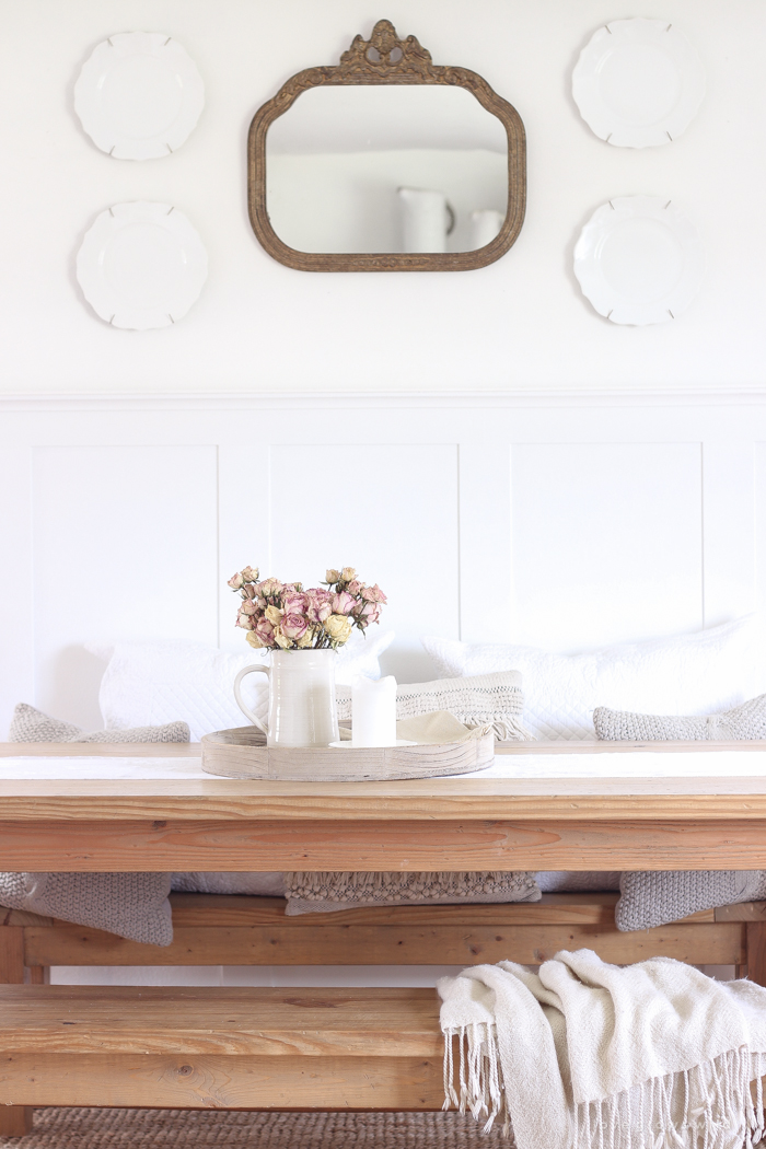 A beautiful farmhouse dining room with a french country twist