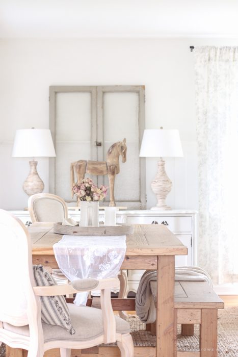 A beautiful farmhouse dining room with a french country twist