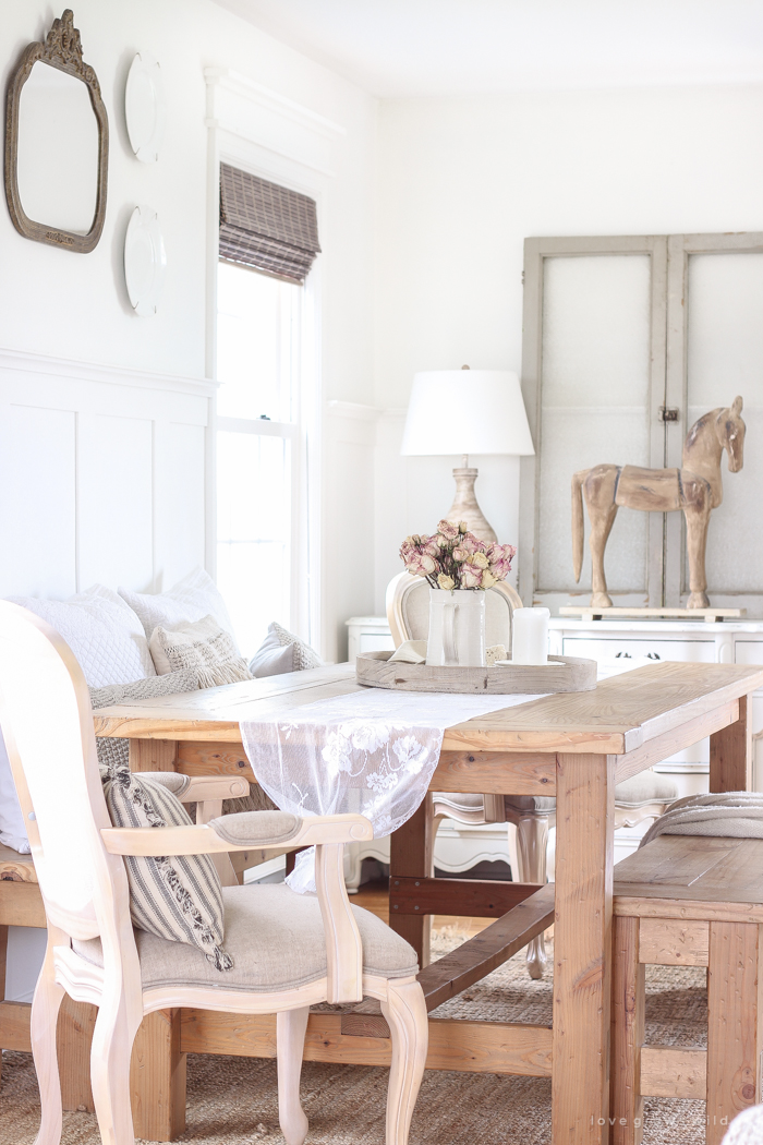 A beautiful farmhouse dining room with a french country twist