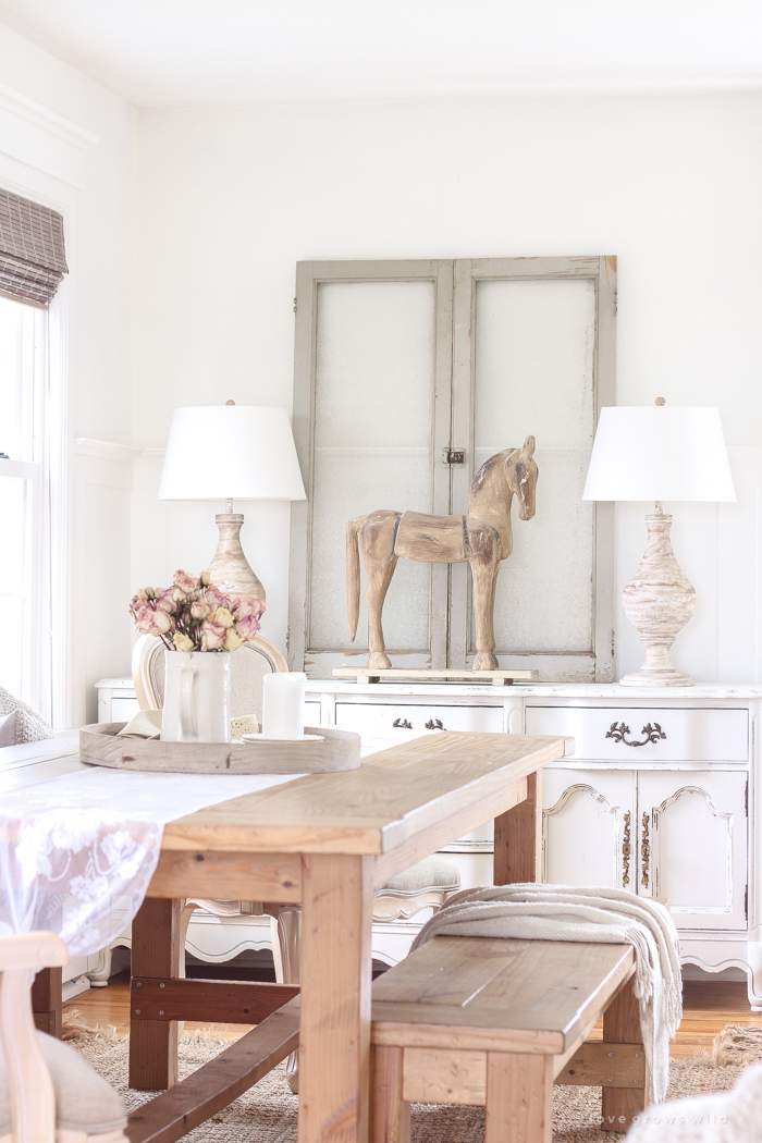 A beautiful farmhouse dining room with a french country twist