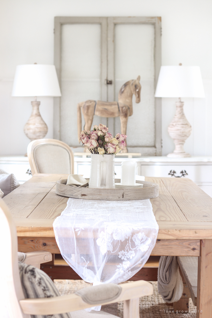 A beautiful farmhouse dining room with a french country twist