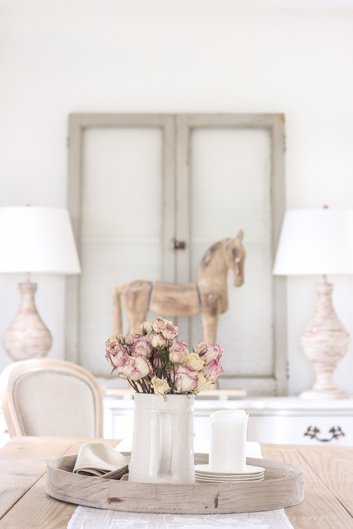 A beautiful farmhouse dining room with a french country twist