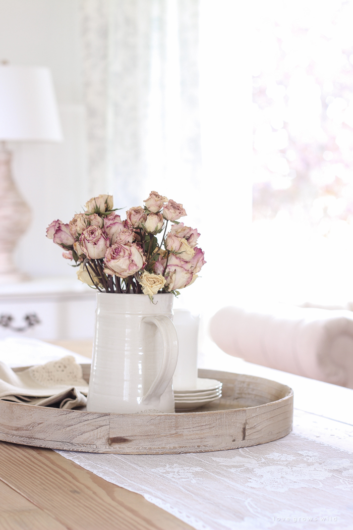 A beautiful farmhouse dining room with a french country twist