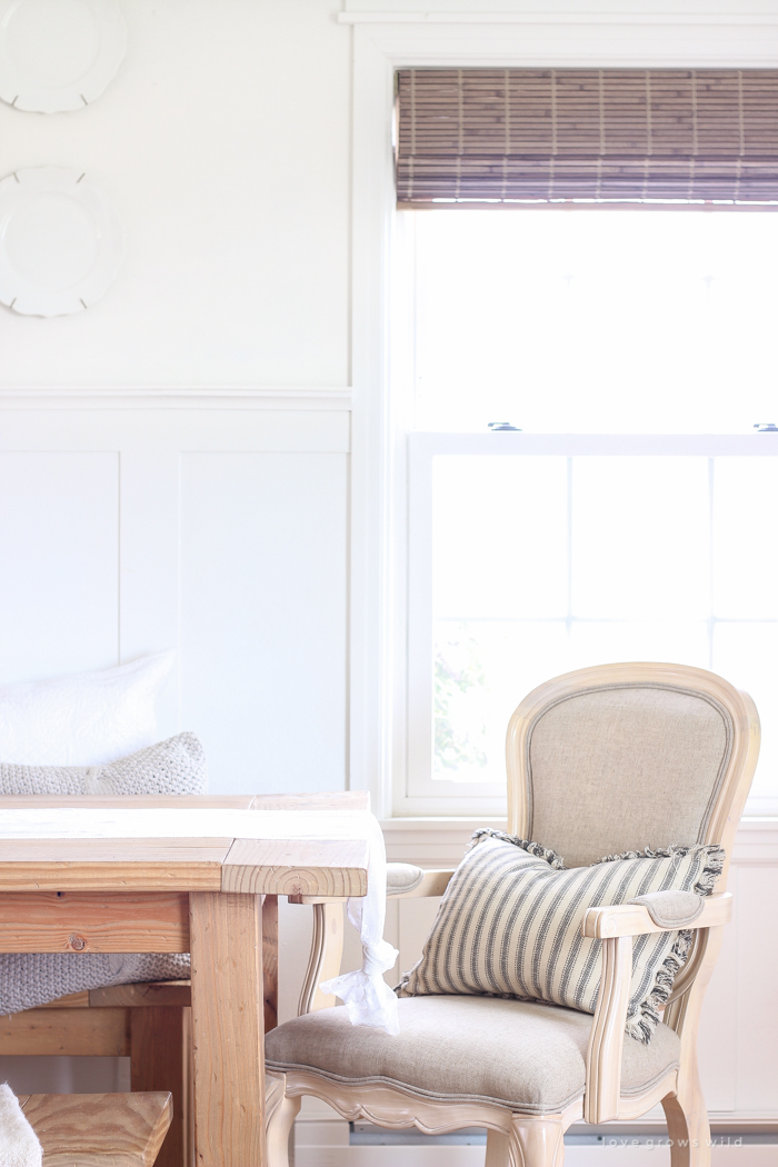 A beautiful farmhouse dining room with a french country twist