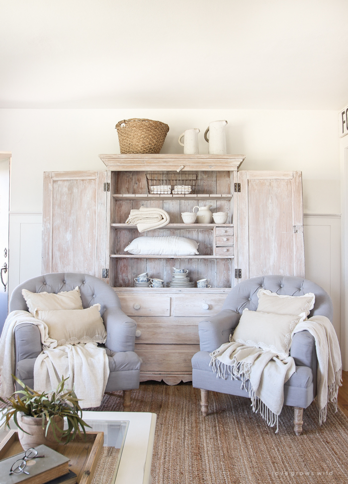 An antique hutch styled simply but beautifully in this Indiana farmhouse