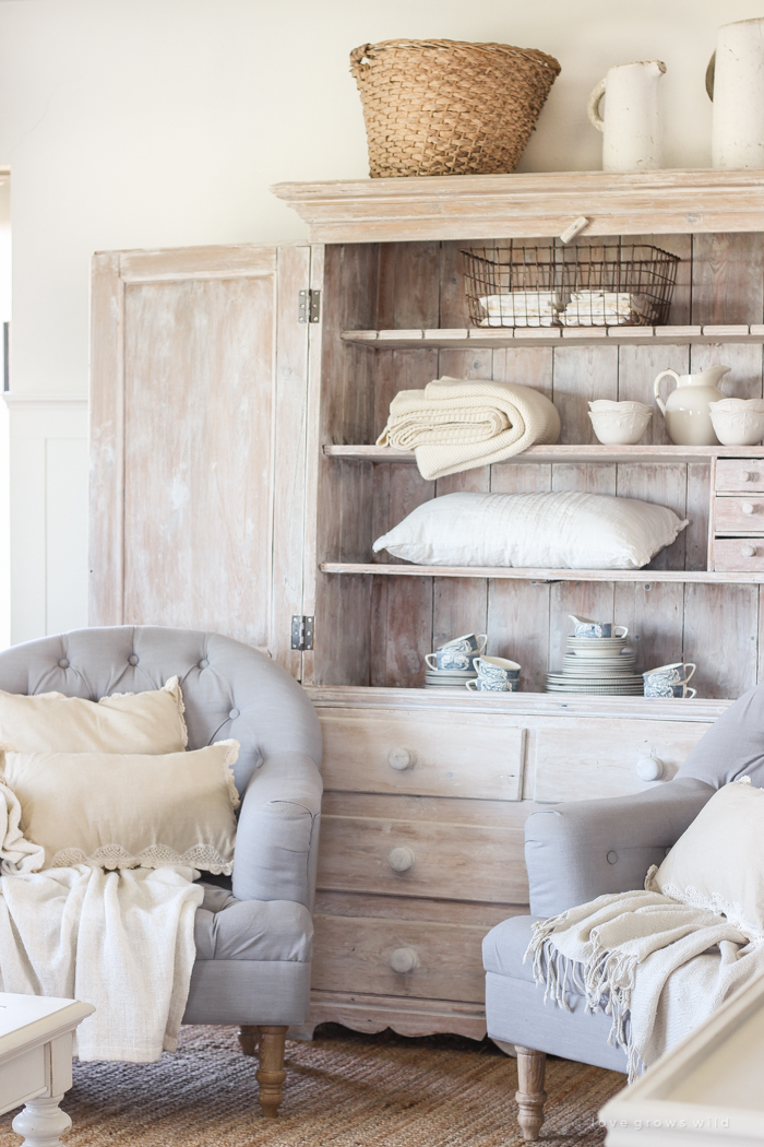 An antique hutch styled simply but beautifully in this Indiana farmhouse