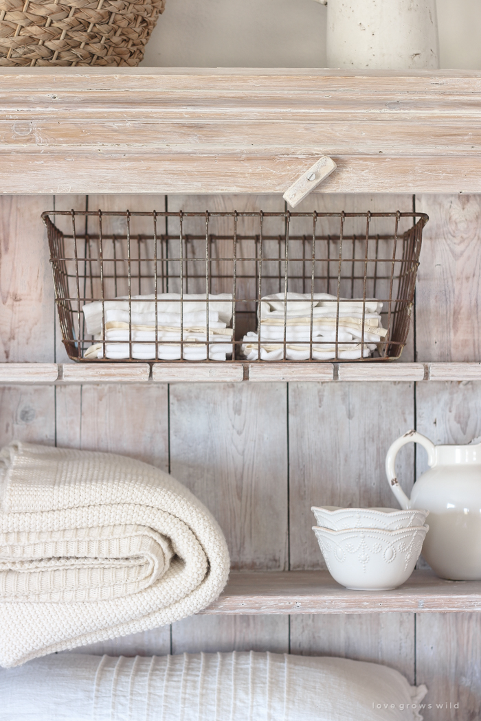 An antique hutch styled simply but beautifully in this Indiana farmhouse