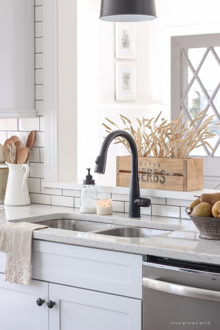 A beautiful farmhouse kitchen decorated with simple, cozy touches of fall!