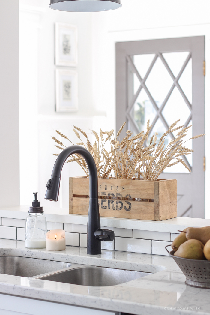 A beautiful farmhouse kitchen decorated with simple, cozy touches of fall!