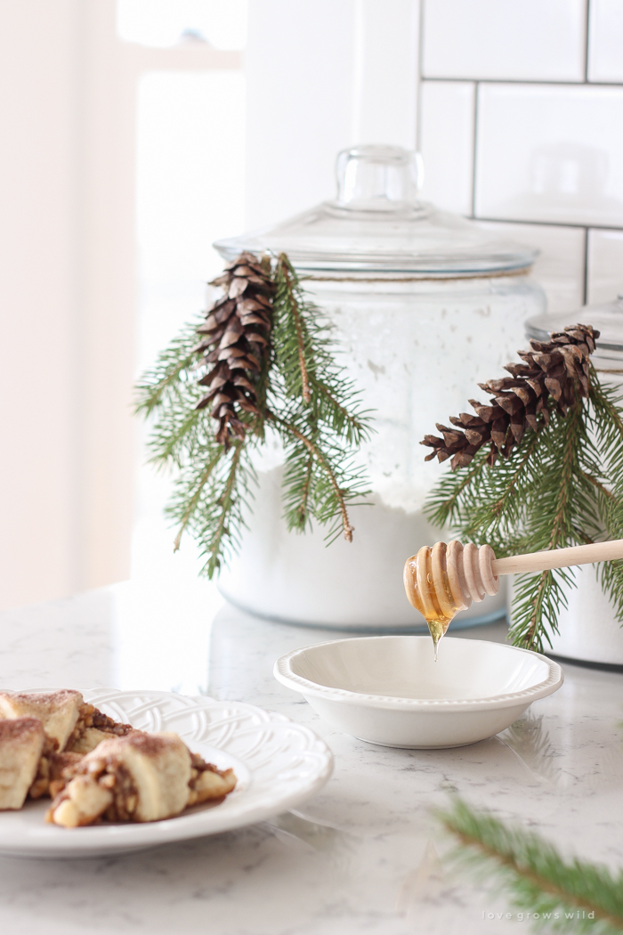 Tender, flaky pastries wrapped with a delicious honey nut filling and sprinkled with a hint of cinnamon sugar on top! These tasty treats are perfect for the holidays or any time of year!