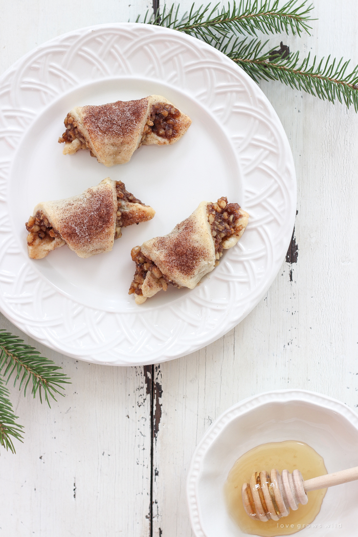 Tender, flaky pastries wrapped with a delicious honey nut filling and sprinkled with a hint of cinnamon sugar on top! These tasty treats are perfect for the holidays or any time of year!