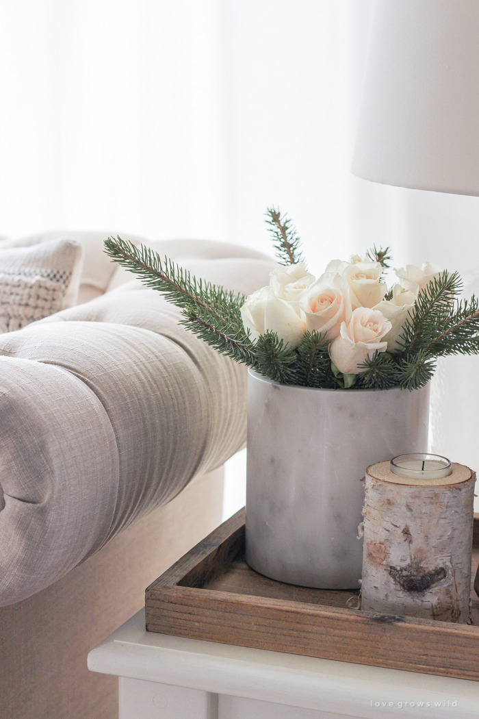 A beautiful farmhouse living room decorated in soft neutrals for the holidays!