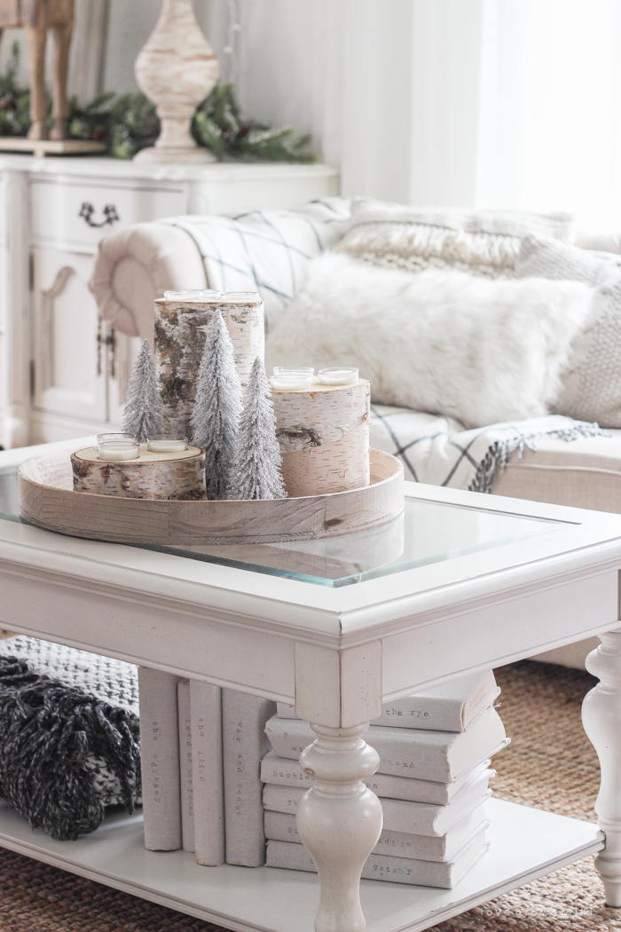 A beautiful farmhouse living room decorated in soft neutrals for the holidays!