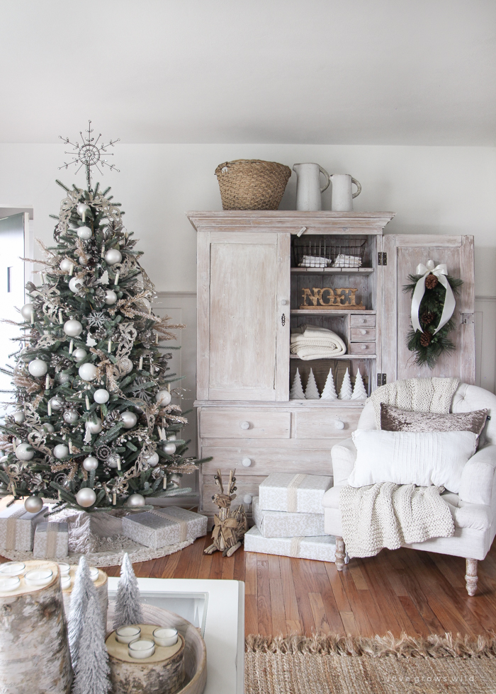 A beautiful farmhouse living room decorated in soft neutrals for the holidays!