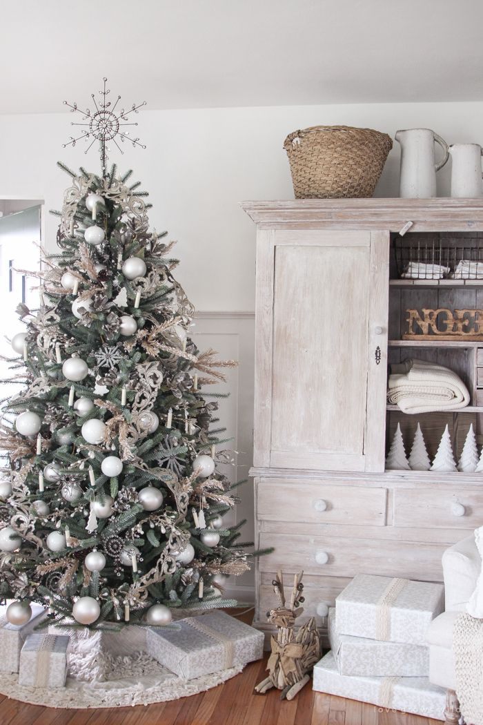 A beautiful farmhouse living room decorated in soft neutrals for the holidays!