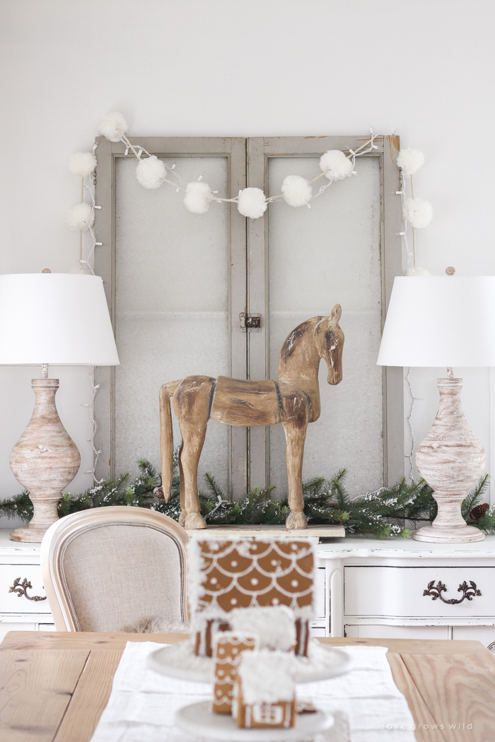 A beautiful farmhouse living room decorated in soft neutrals for the holidays!