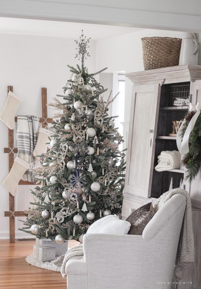 A beautiful farmhouse living room decorated in soft neutrals for the holidays!