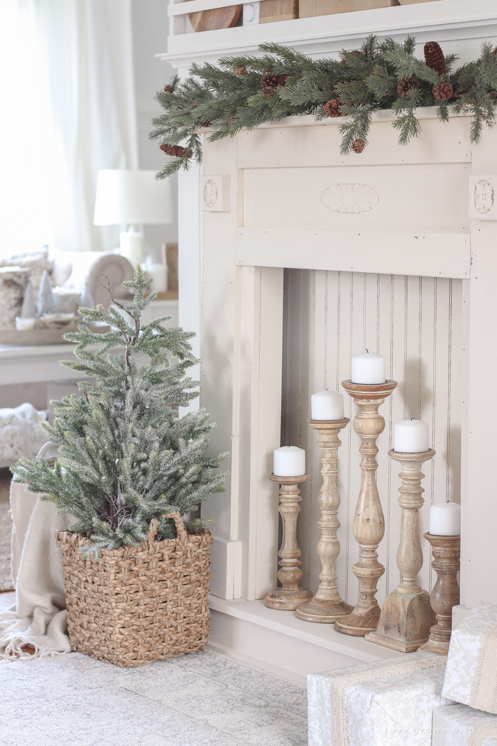 A rustic mantel is given a big makeover for the holidays! See how milk paint transformed this cozy cottage mantel.