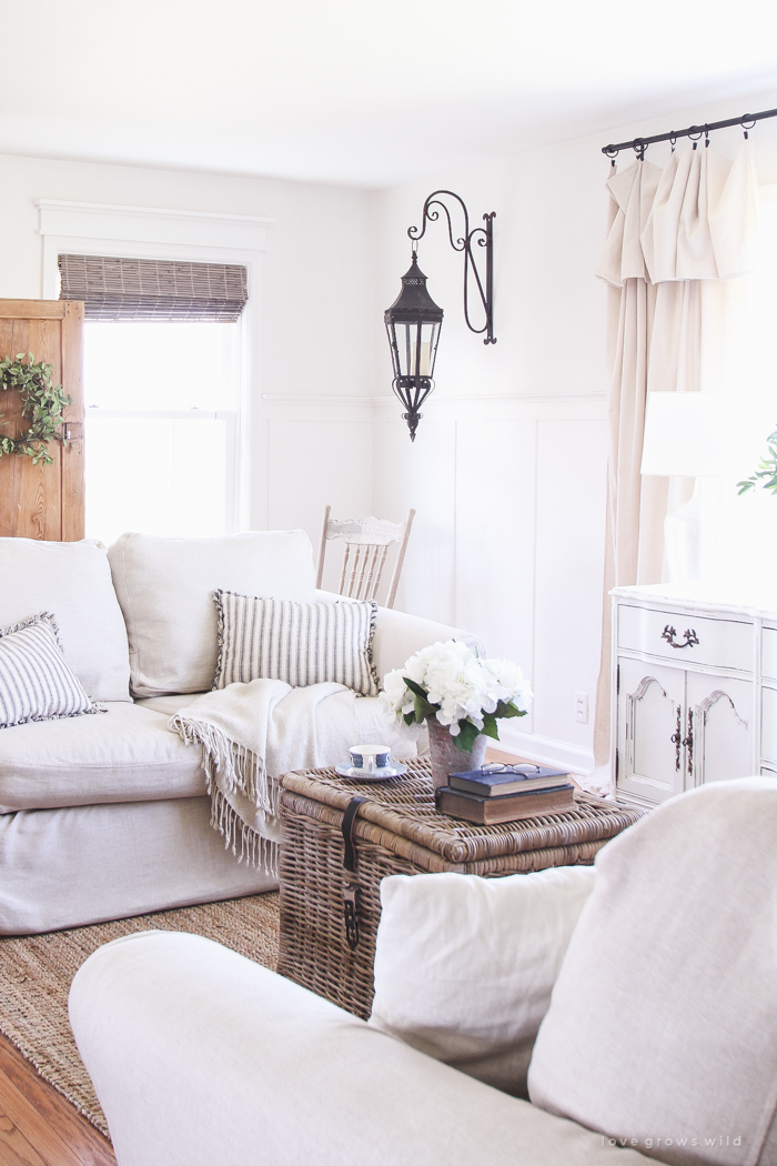 See how this small farmhouse living room transformed and evolved over the years from dark and dated to light, bright and beautiful! 