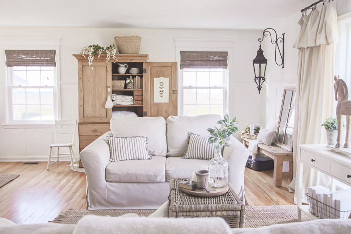 See how this small farmhouse living room transformed and evolved over the years from dark and dated to light, bright and beautiful! 