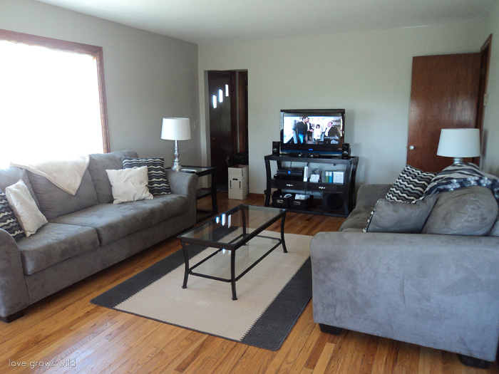 See how this small farmhouse living room transformed and evolved over the years from dark and dated to light, bright and beautiful! 