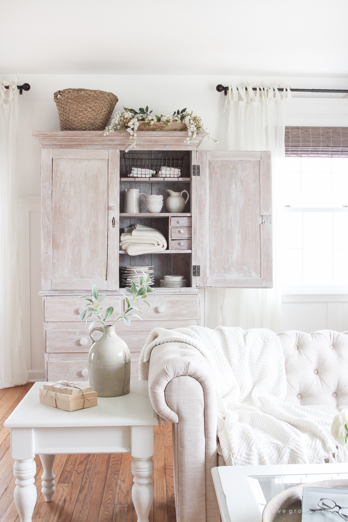 See how this small farmhouse living room transformed and evolved over the years from dark and dated to light, bright and beautiful!