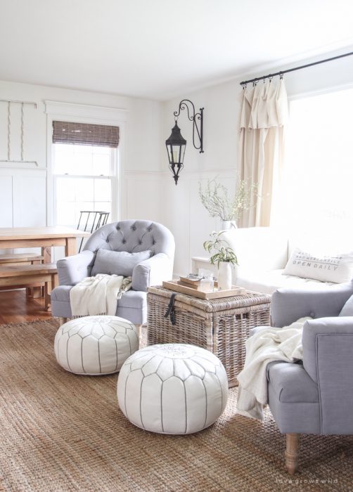 See how this small farmhouse living room transformed and evolved over the years from dark and dated to light, bright and beautiful!
