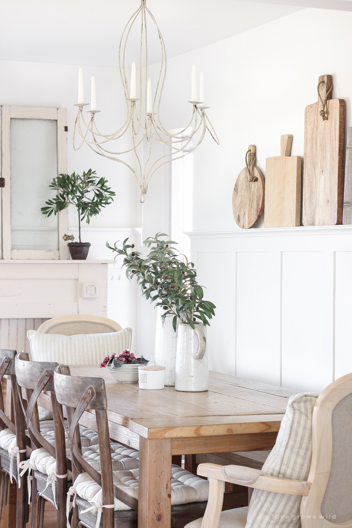 This dining room shares space with a living room, but maximizes style and looks stunningly fresh.