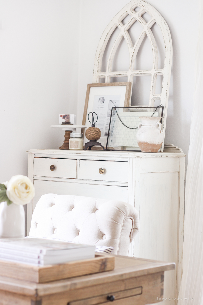 A lovely casual home office with lots of light, soft textures, and gorgeous greenery. 