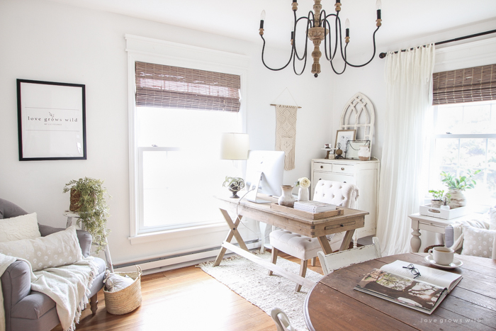 A lovely casual home office with lots of light, soft textures, and gorgeous greenery. 