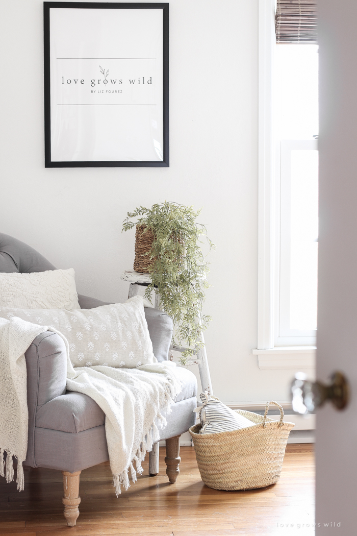 A lovely casual home office with lots of light, soft textures, and gorgeous greenery. 