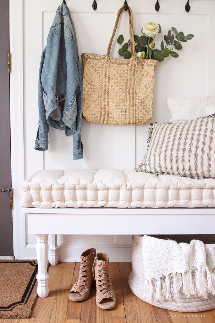 Learn how to make a beautiful custom bench for a bedroom, dining room, or entryway with this easy DIY tutorial!