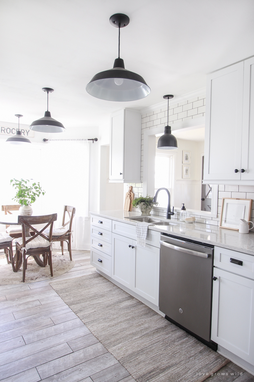 A cozy farmhouse kitchen decorated simply with elements from nature