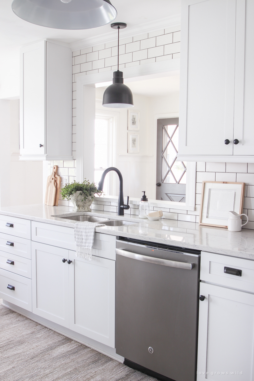 A cozy farmhouse kitchen decorated simply with elements from nature