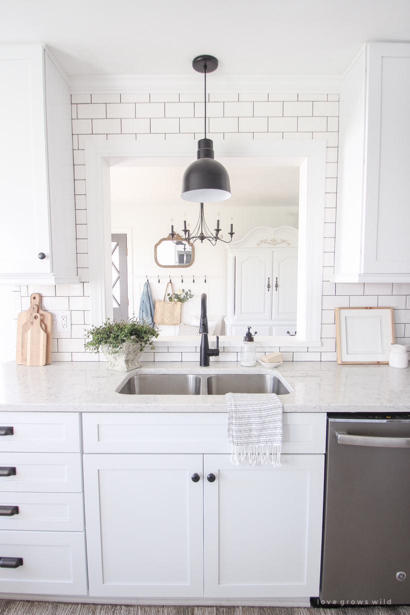 A cozy farmhouse kitchen decorated simply with elements from nature