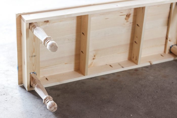 Learn how to build this beautiful custom bench for your entryway, dining room table, or bedroom with this quick and easy tutorial!