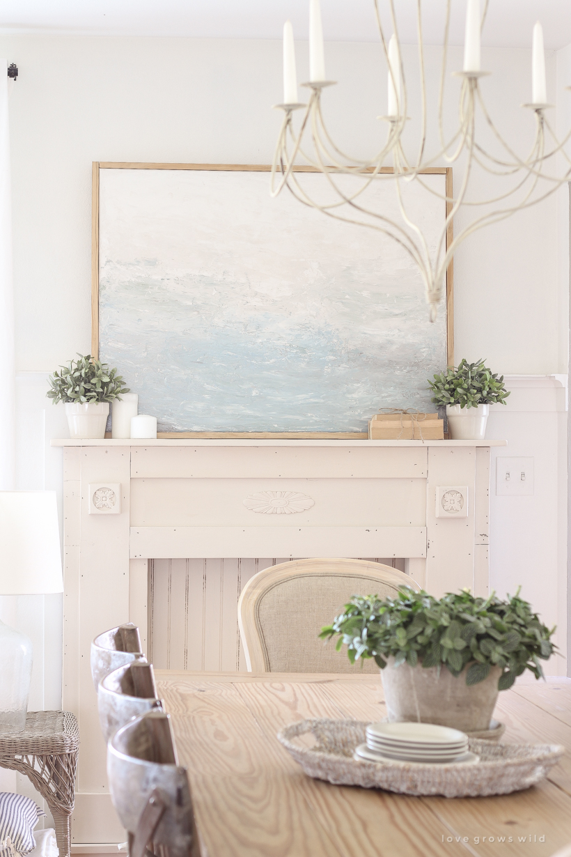 Learn how to decorate on a budget by creating beautiful art for your home with this easy tutorial. Hint... you don't need to be an artist to create art! See the entire process from blank canvas to completed painting using only one tool. 